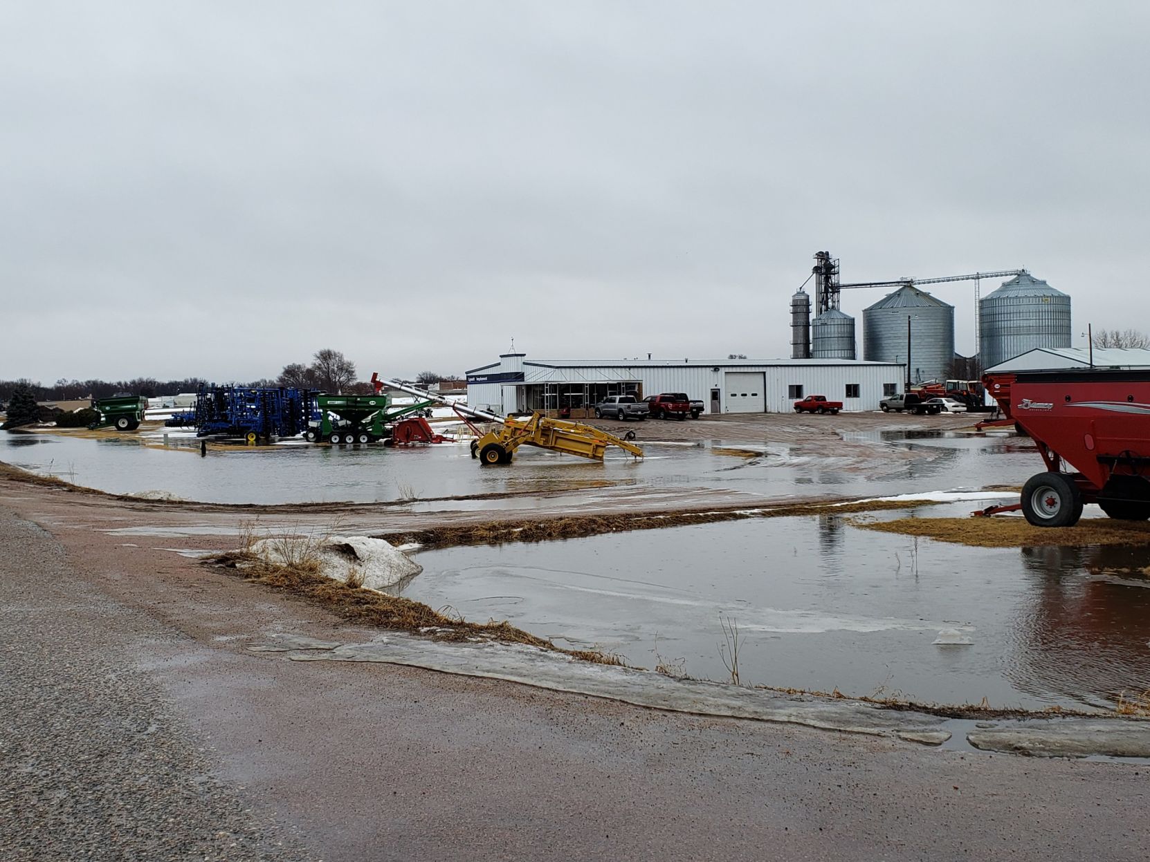 Flood waters continue to rise south of town
